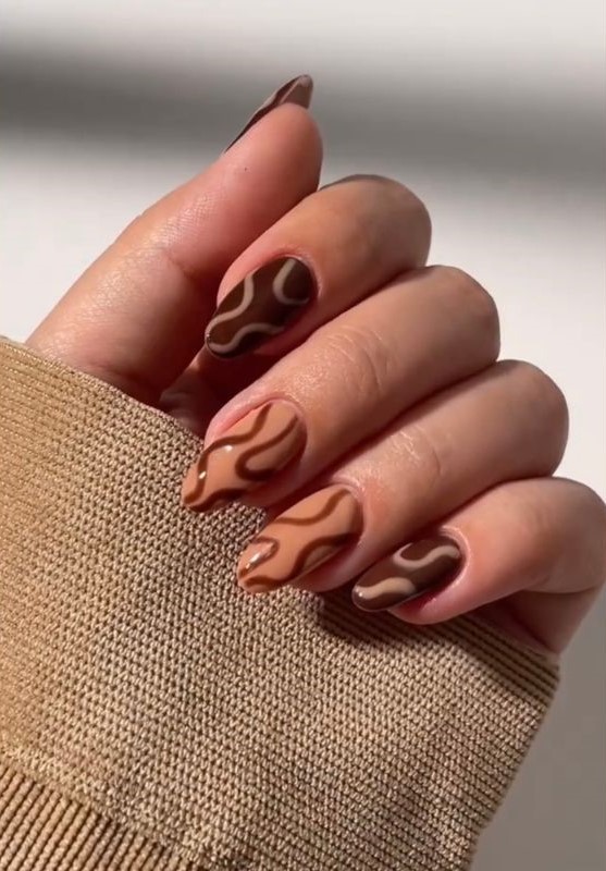 Brown Curls Fall Nail Design 