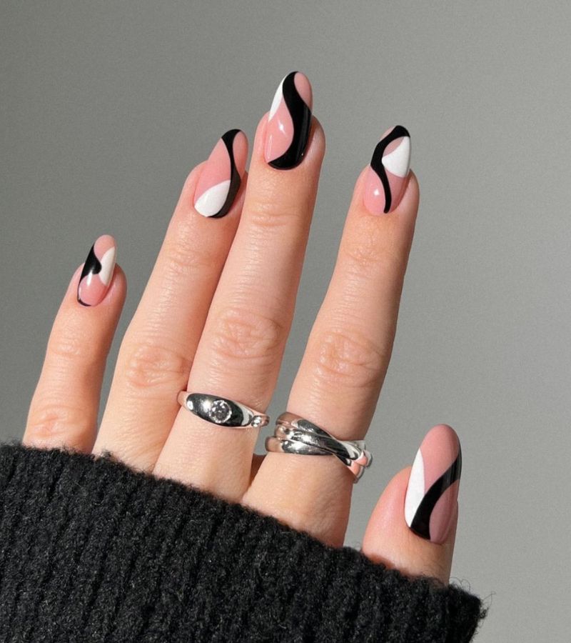 Black and white swirls on pink base