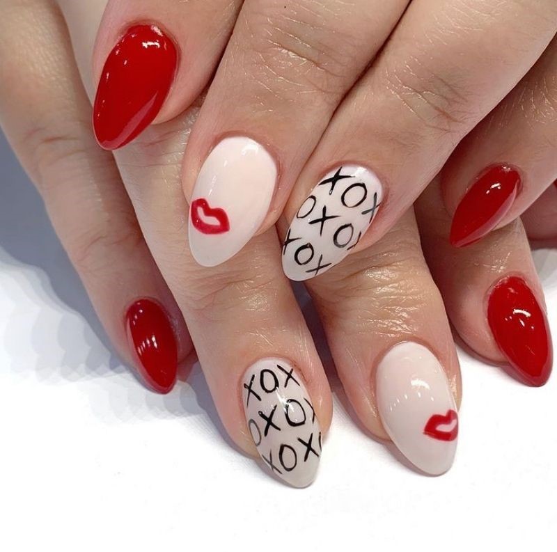 Red and white nails with lips and XOXO design - Cute Valentines Nails