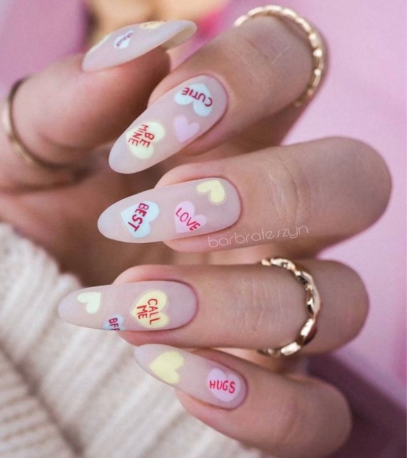 Light Base With Phrases Inside Hearts - Cute Valentines Nails