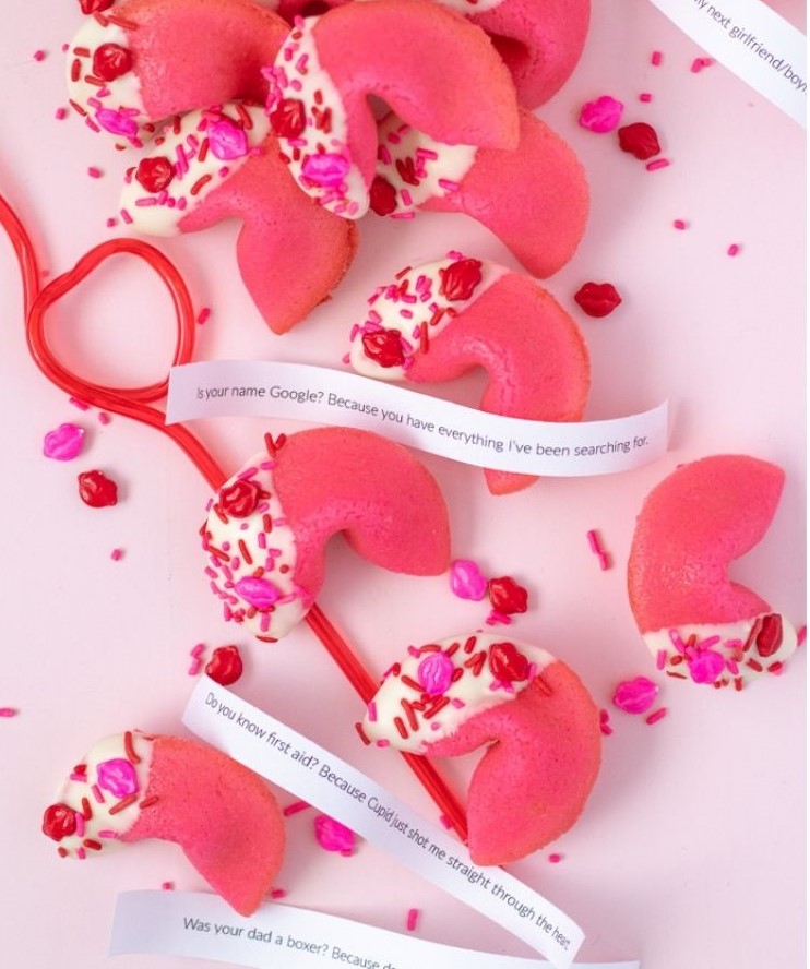 Romantic DIY Valentine's Day Gifts - red fortune cookies with white cream and sprinkles 