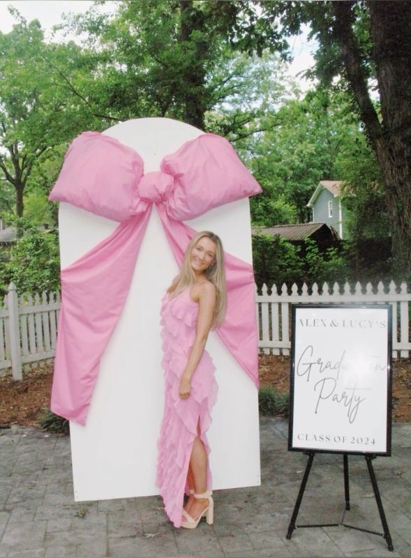 giant pink bow graduation photo booth ideas