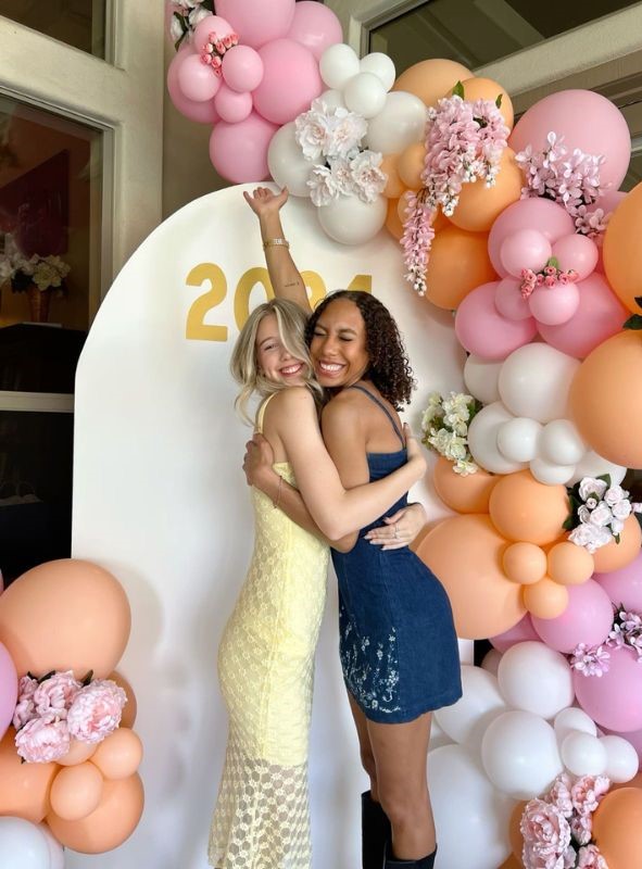 peachy floral balloon arch