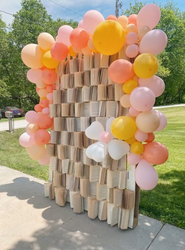 book pages wall graduation backdrop ideas