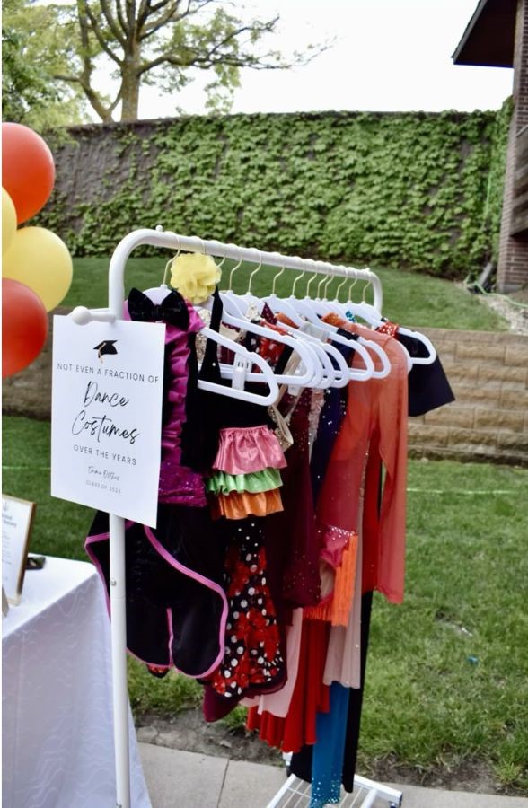 “Memory Lane” Outfit Display unique graduation party ideas
