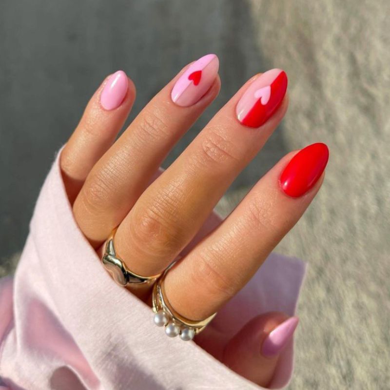 Red and pink split nails with heart