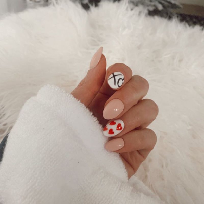 XO nails with white and nude