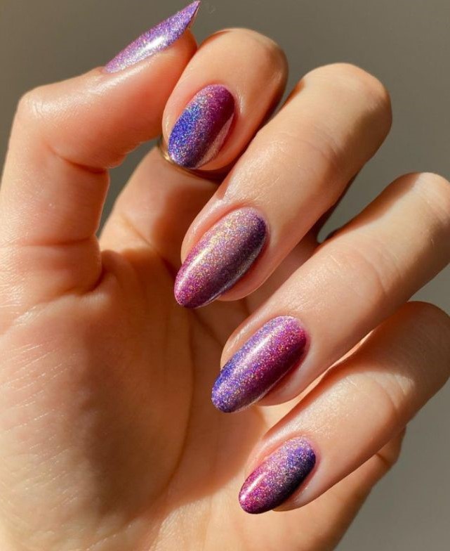 blue and purple glitter nails 