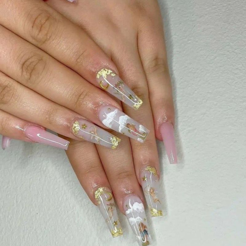 white and soft pink nails with gold flakes