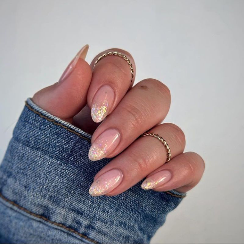 sparkly gradient gold tips - graduation nails