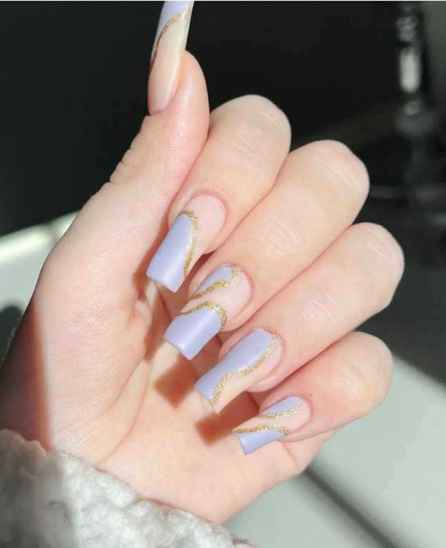blue pastel with gold flakes on the corners - graduation nails