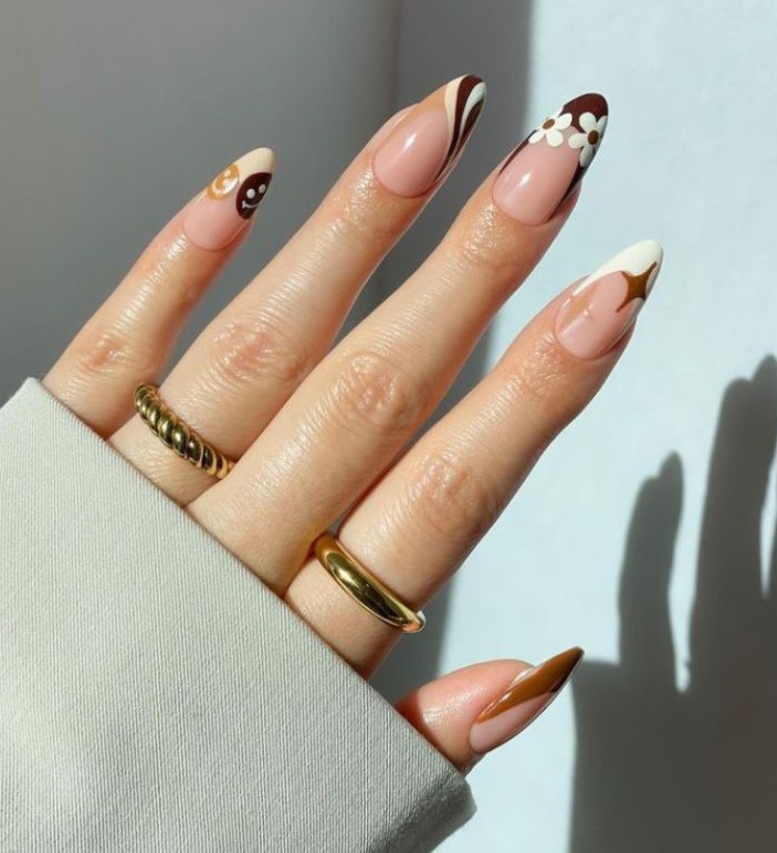 brown abstract fall french tip nails