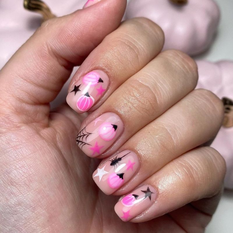 Pink pumpkins with black spiders