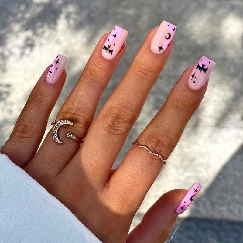 Pink nails with black bats