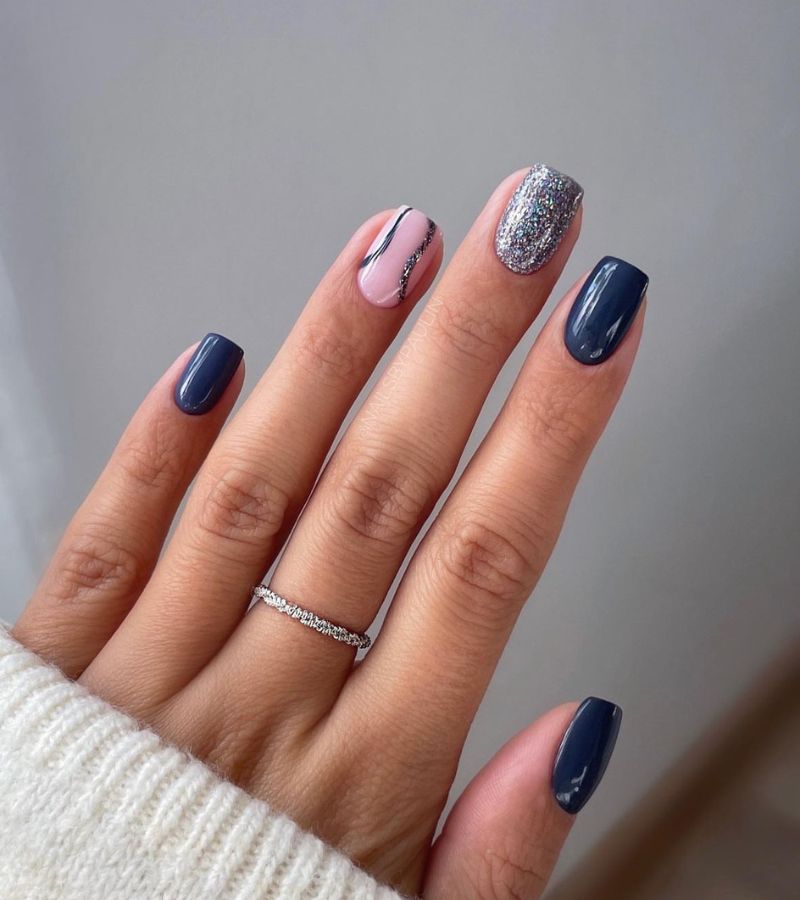 dark blue nails with hint of sparkle