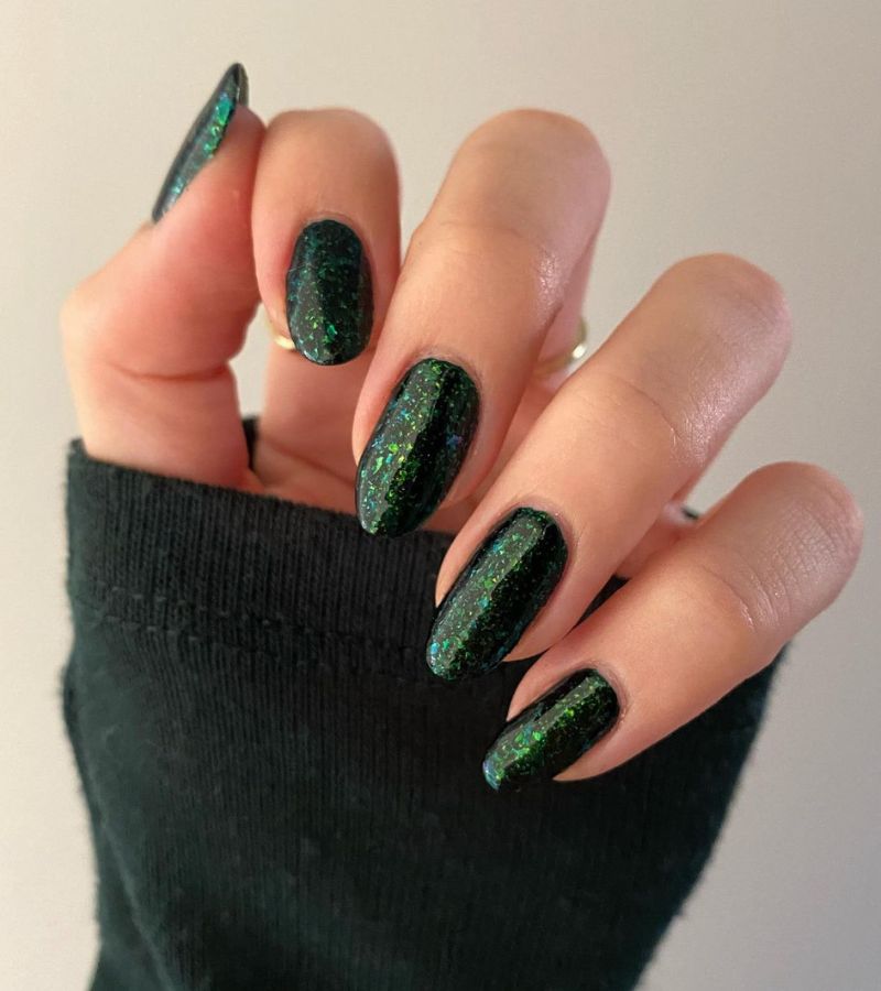 Dark Green sparkles nails 