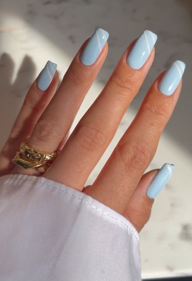 baby blue nails with white slits
