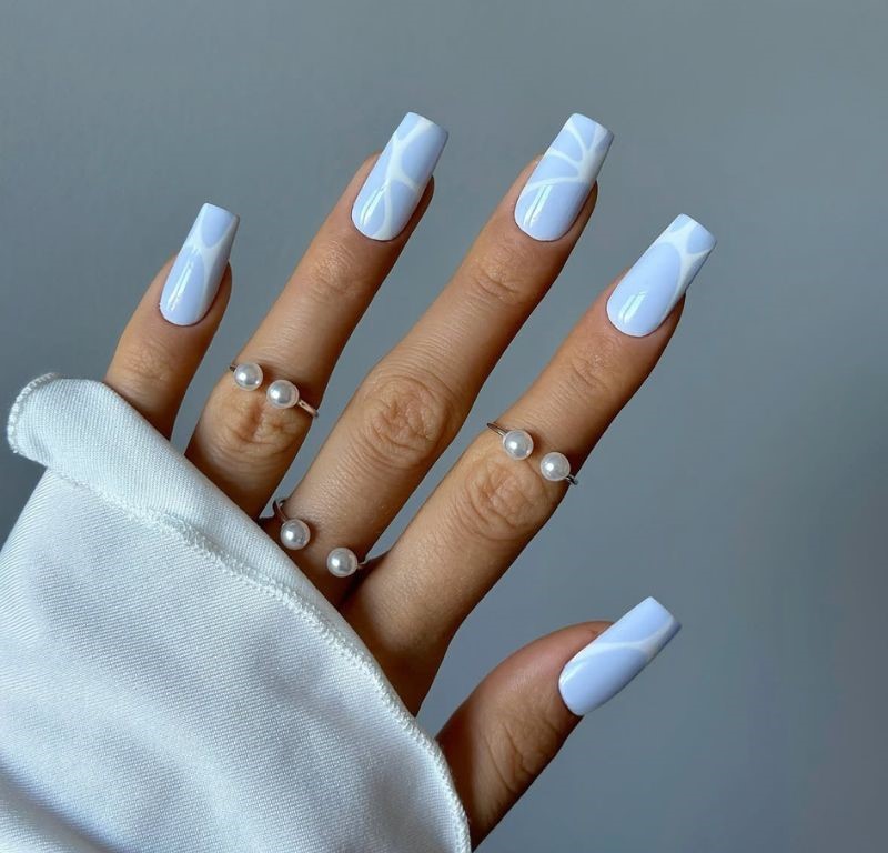 baby blue nails with white streak