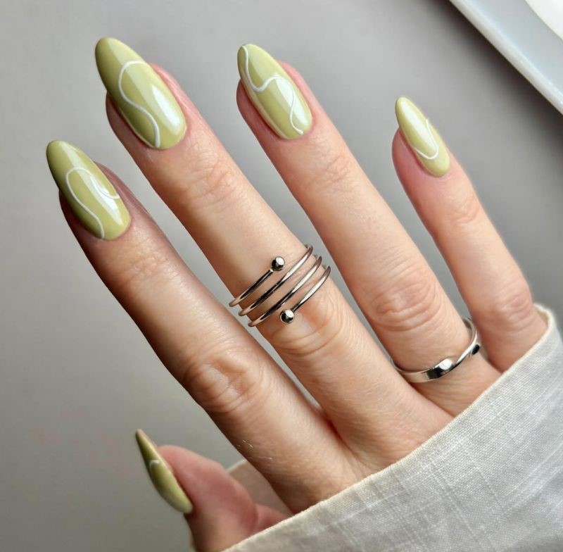 pistachio matcha white swirl nails