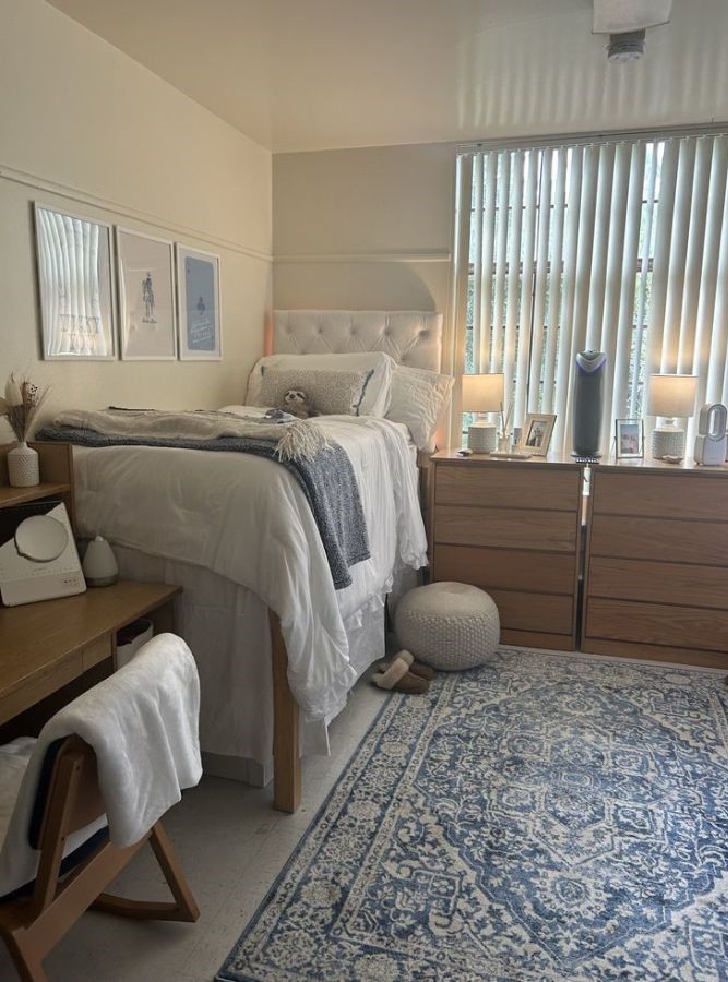 small dorm with basic furniture styles using beach colors, rattan bins, and airy textiles
