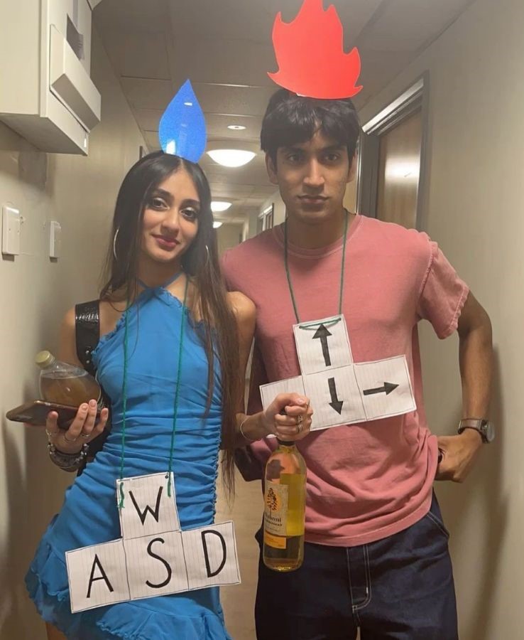 funny Halloween costume for couples dressed as fire boy and water girl