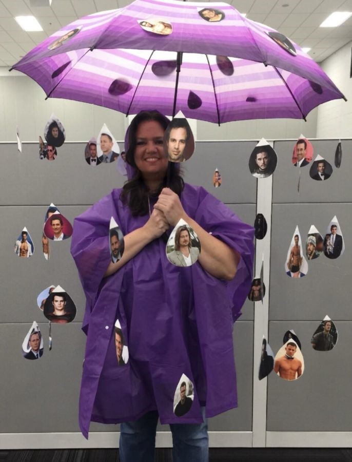 raining men purple umbrella with men photos hanging