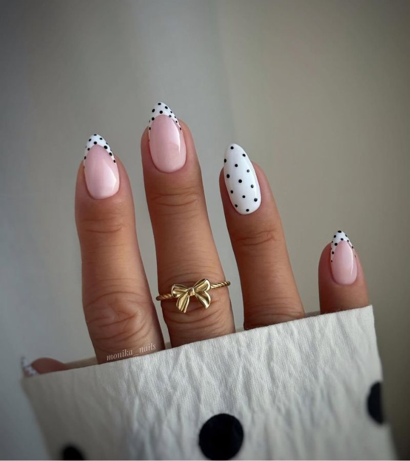 white polka dot nails
