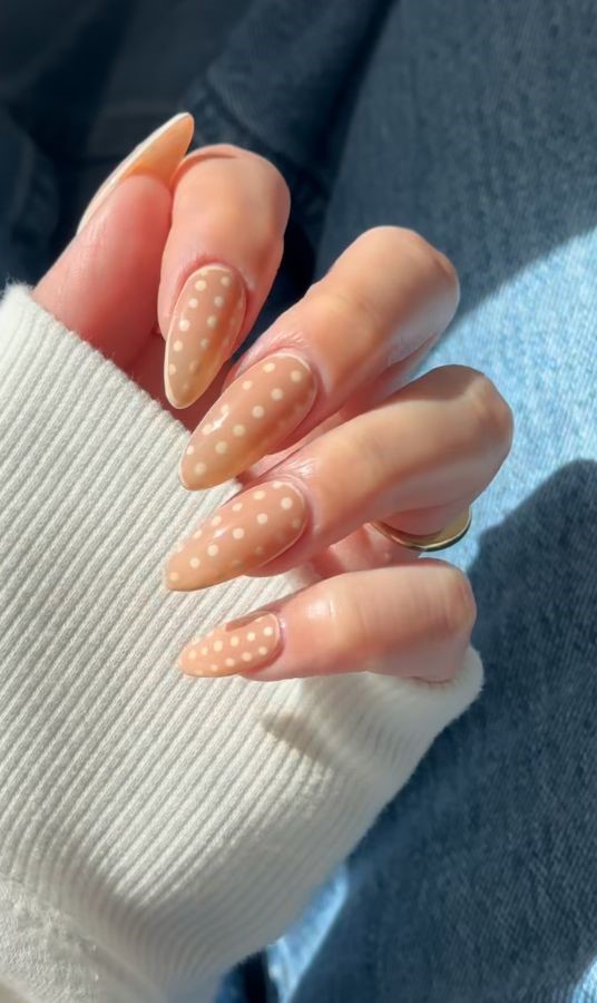 nude polka dot nails