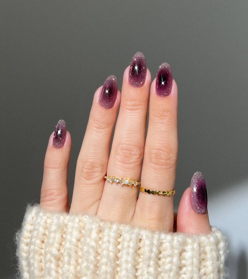 plum aura festive nails