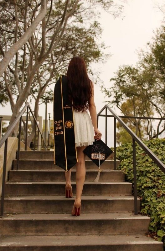 back pose with the graduation stole