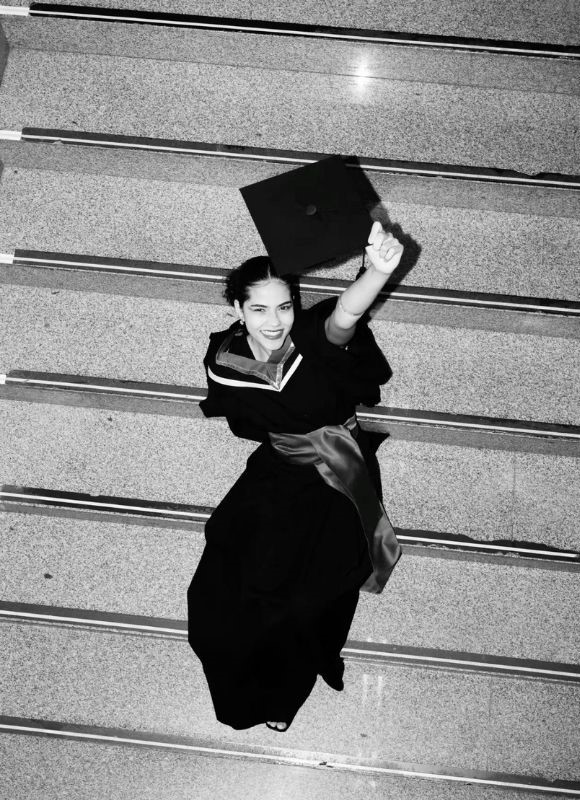 bird eye view with cap and gown on stairs