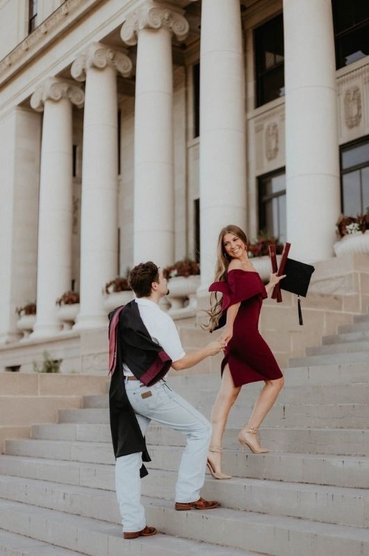 holding hands on the stairs