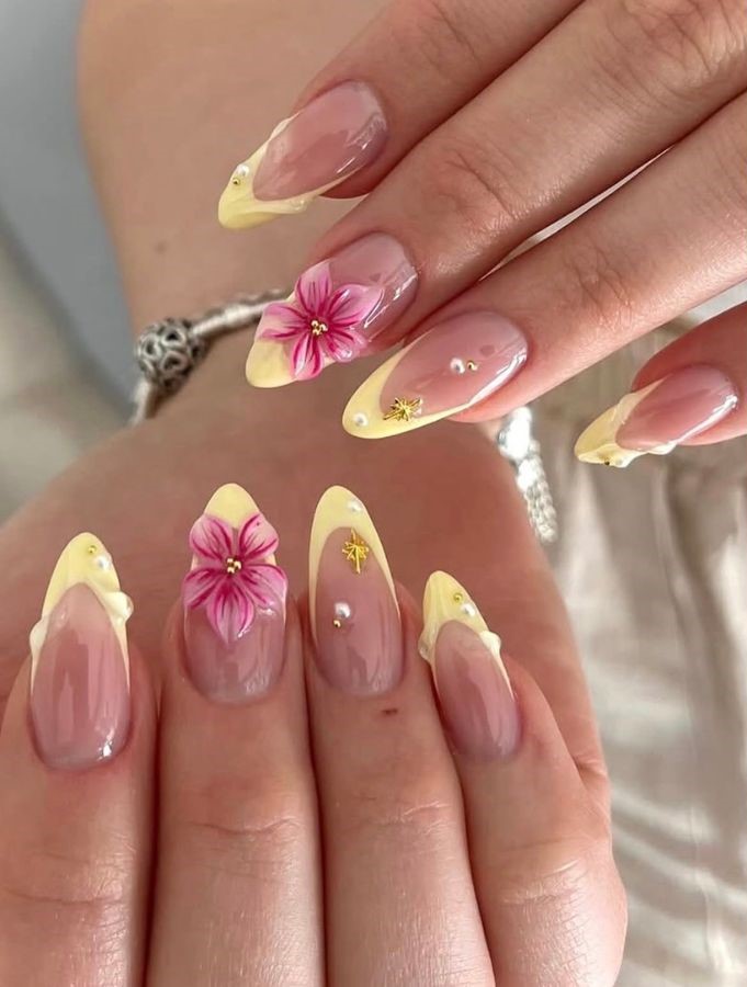 butter yellow nails with 3d pink flowers