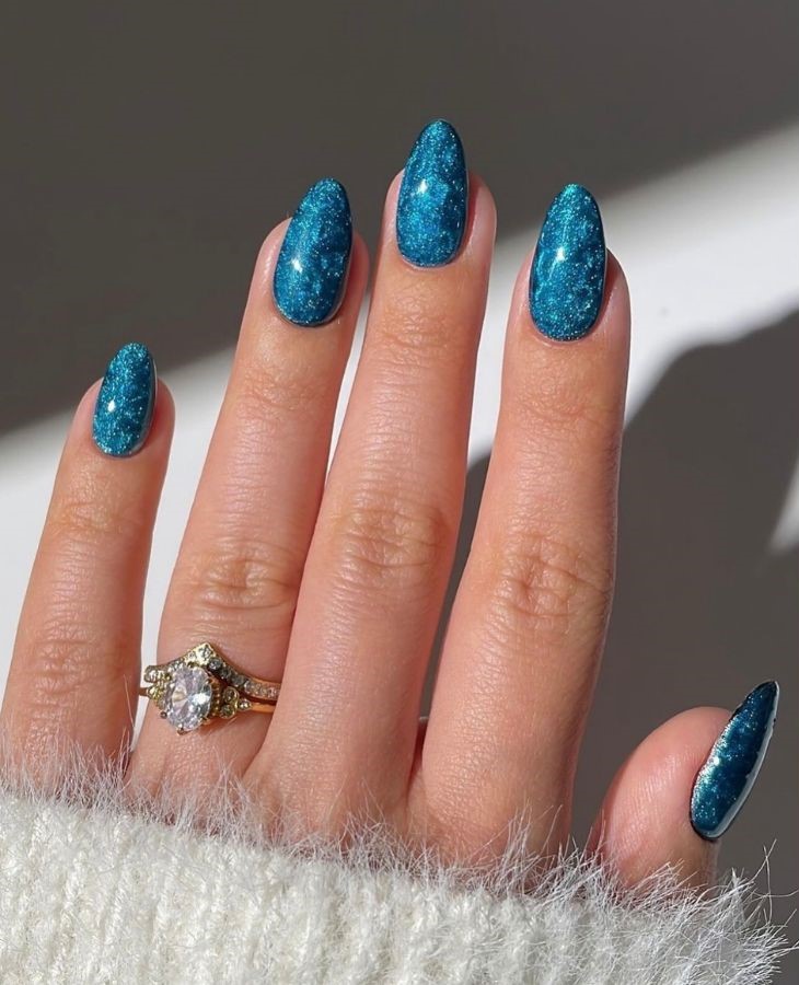 sparkly blue ocean nails